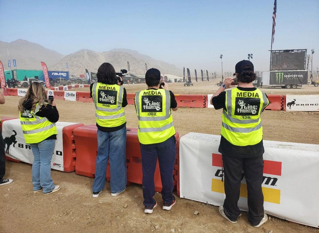 Media-track students filming the race