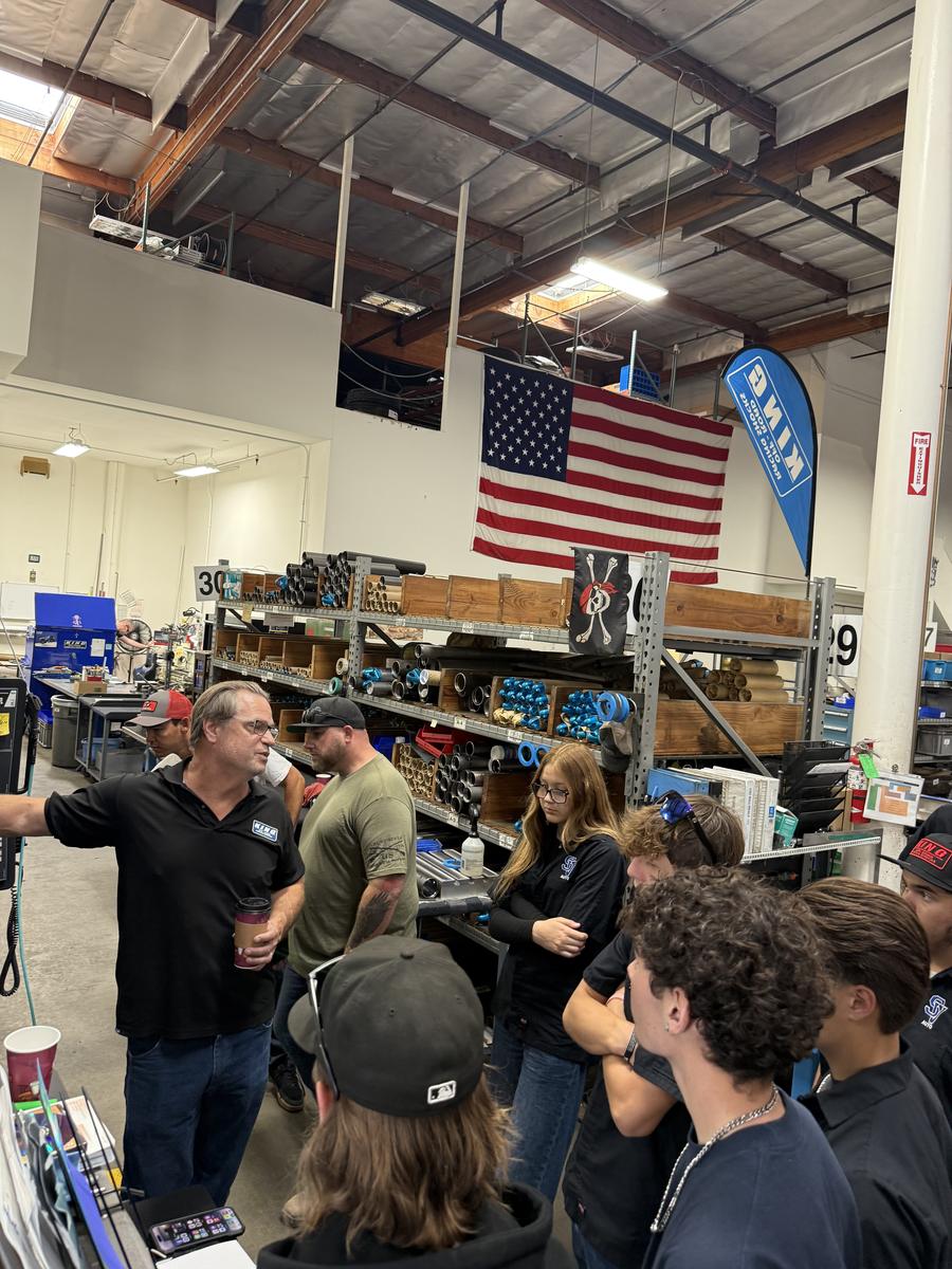 Jeff Musgrave talks students through the assembly bays