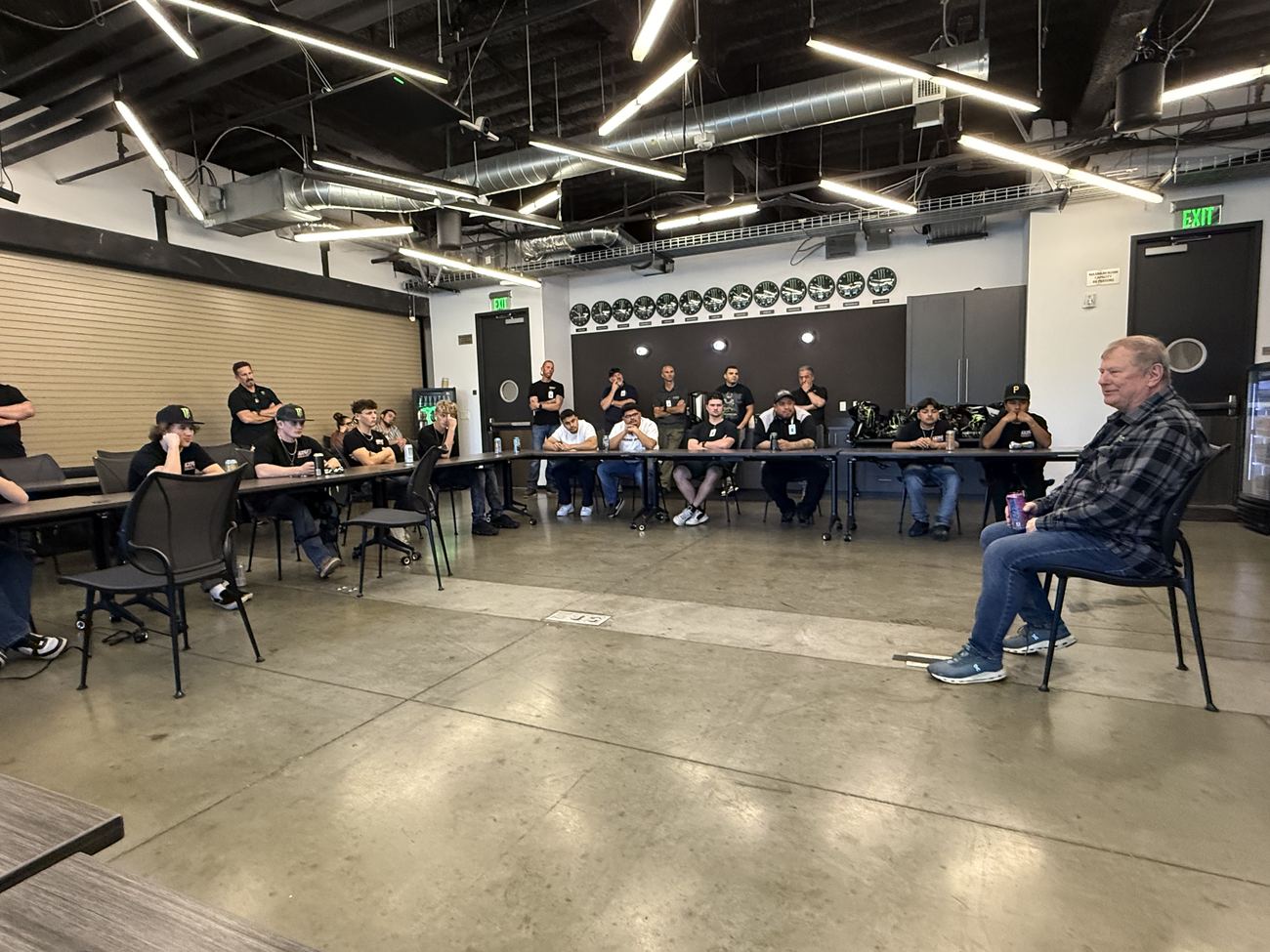 Tom Kelly, CFO of Monster Energy, sharing business advice with Ultra4Next students at Monster world headquarters