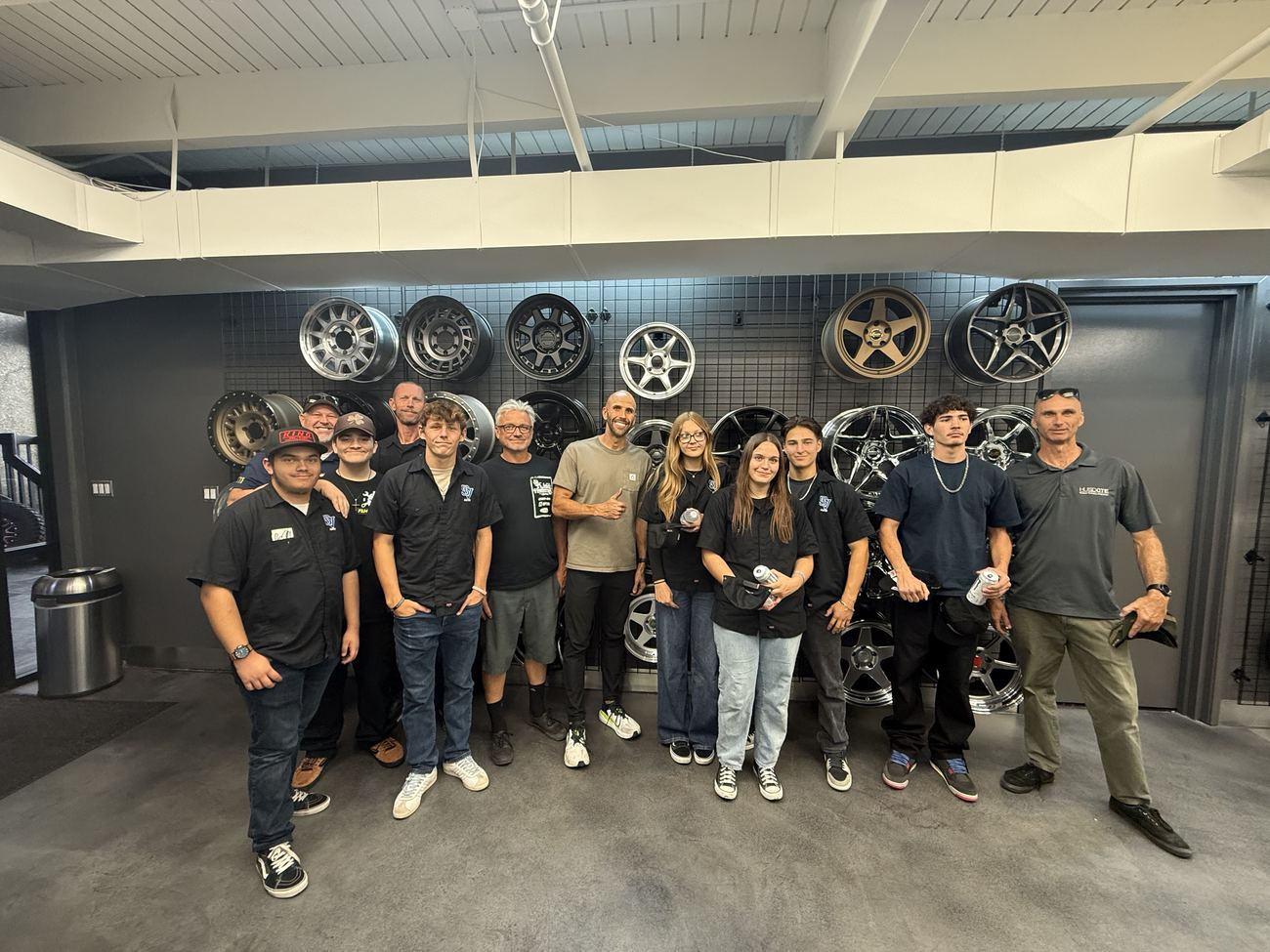 The group in front of Raceline’s wheel wall