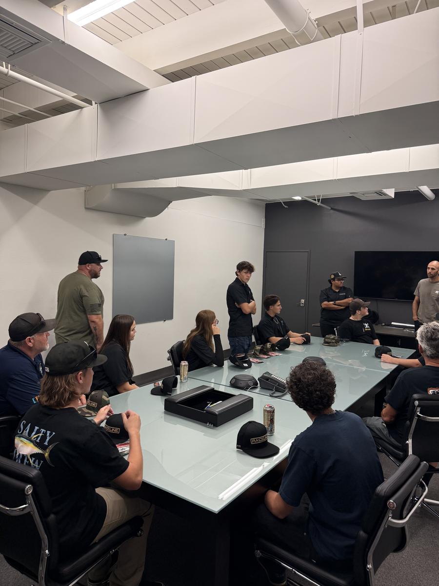 Around the conference table before the floor walk